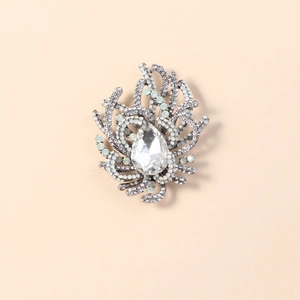 Vintage silver coral branch brooch with large teardrop crystal and blue stones