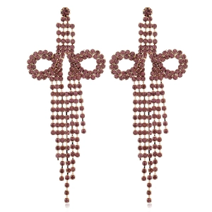 Elegant gold bow tassel earrings featuring deep pink rhinestones in a cascading design