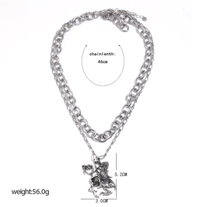 Detail view of retro silver necklace with skeleton knight pendant and size dimensions