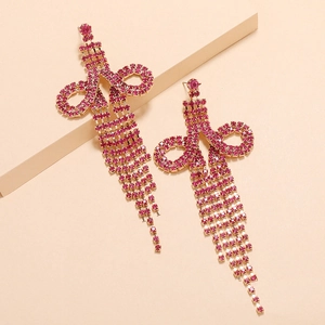 Chic long tassel drop earrings with rose red rhinestones and golden knot design