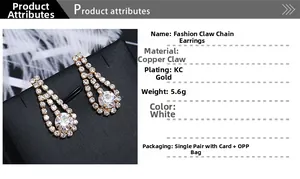Detailed view of KC gold plated claw chain earrings with white rhinestones and specifications