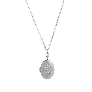 Detailed macro view of silver oval locket necklace featuring a diamond-set center