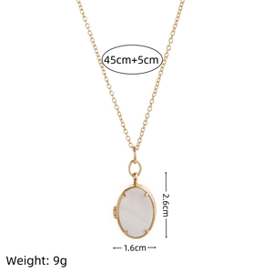 Gold oval locket necklace with white shell inlay, measurements 45+5cm and weight 9g