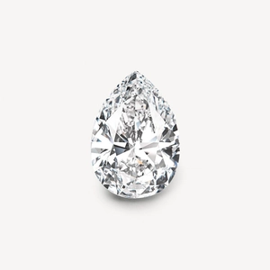 Close-up of a pear-cut locket pendant with transparent facets and 18k gold finish