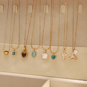 Elegant gold-plated stainless steel necklace collection with shell and gemstone pendants