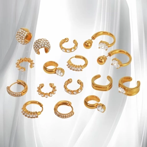 Minimalist gold ear cuff and hoop earring set with sparkling zircon stones
