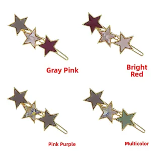 Star-shaped hair clips with gold metal edges and marble texture resin in four colors