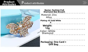 Detail of bee brooch showing gold base with white diamonds and zinc alloy material specs