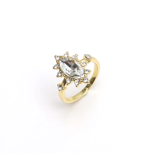 Gold marquise-cut starburst open ring with sparkling zircon stones on white background