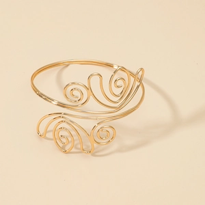 Chique gouden spiraalarmband voor bovenarm met vintage geometrisch filigraanontwerp