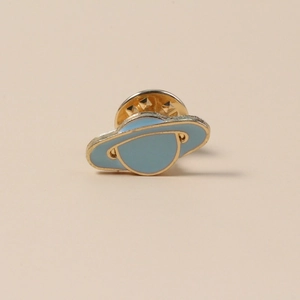 Creative blue Saturn planet enamel brooch with golden metal finish and butterfly clutch pin