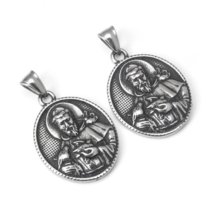 Vintage stainless steel oval pendant with St. Francis relief and silver finish