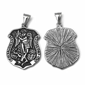 Detail of Saint Michael shield pendant showing embossed front and textured back