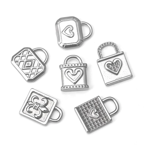 Set of six stainless steel heart and fleur-de-lis lock charms for DIY jewelry making