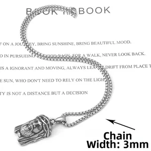 Detailed view of silver stainless steel Jesus pendant with a 3mm box chain on white background
