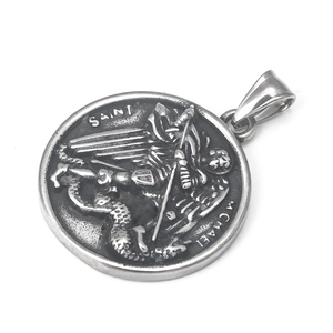 Vintage stainless steel Saint Michael pendant with detailed angel engraving on white background