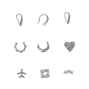 Set of 9 stainless steel jewelry charms featuring airplane, heart, and star shapes