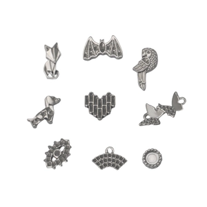 Assorted stainless steel charms including fox, bat, and dog shapes for DIY jewelry making