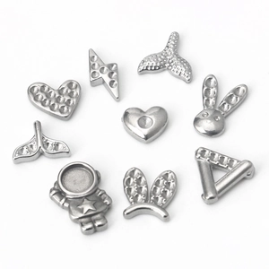 Pendentifs en acier inoxydable poli avec motifs de cœur, éclair et queue de poisson