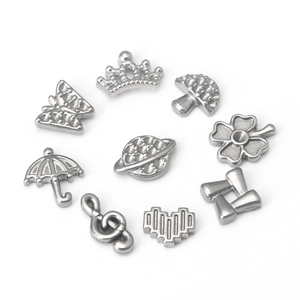 Set of 9 stainless steel silver charms including crown music note and clover pendants