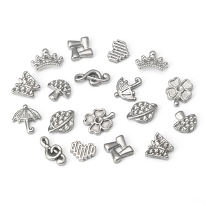 Polished stainless steel DIY charms set featuring crown, music note and clover shapes