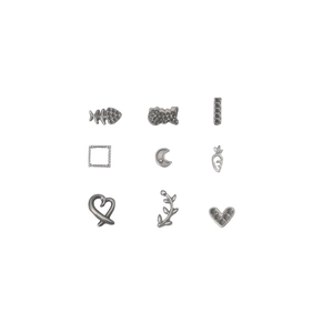 Collection of stainless steel DIY jewelry charms including moon carrot and heart shapes