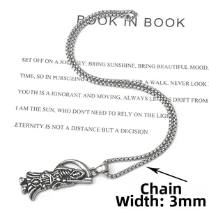 Detailed macro view of a vintage stainless steel grim reaper scythe pendant with a 3mm box chain