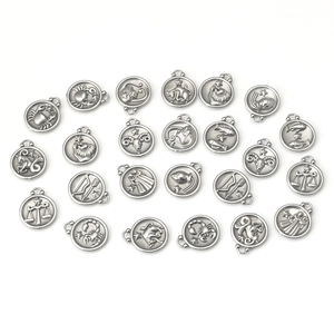 Silver zodiac sign pendants in stainless steel with embossed constellations for DIY jewelry