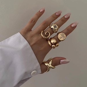 Chunky 18k gold plated stainless steel layered rings set with bohemian charms