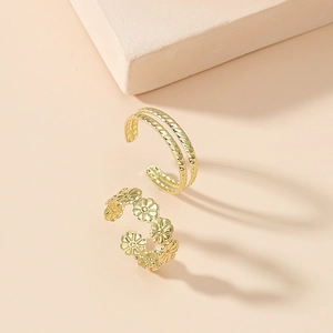 Minimalist vintage gold toe rings set featuring twisted rope and daisy flower designs