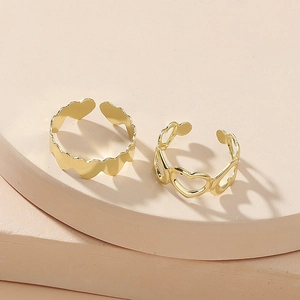 Set of two gold hollow heart open rings in minimalist metal alloy for women