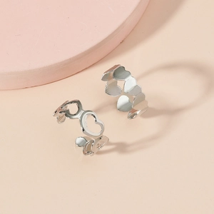 Set of two hollow heart open toe rings in silver alloy with a minimalist design