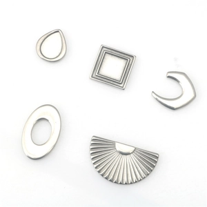 Set of minimalist stainless steel geometric pendants including teardrop and fan shapes