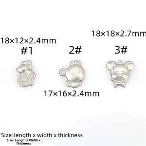 Detailed view of three stainless steel mouse pendants with measurements and dimensions