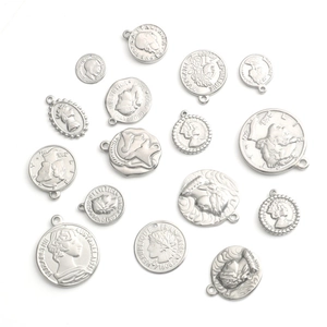 Set of stainless steel coin pendants with embossed queen portraits for jewelry making