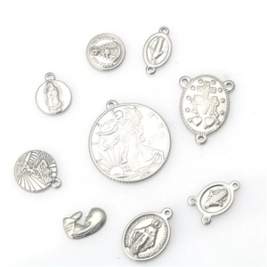 Assorted silver stainless steel religious medals and Liberty coin pendants set