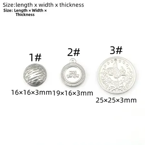 Detailed comparison of three stainless steel coin pendants with embossed patterns and sizes
