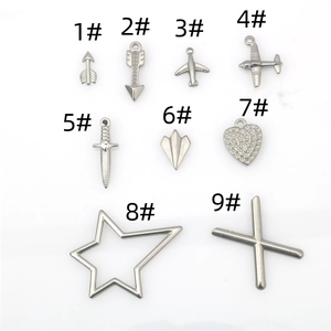 Detailed collection of 9 stainless steel punk charms including airplane heart and star shapes