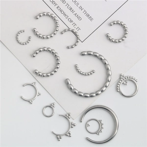 Polished stainless steel moon-shaped pendant set for DIY jewelry making and body piercing