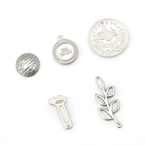 Five-piece set of punk stainless steel pendants featuring wrench and leaf designs