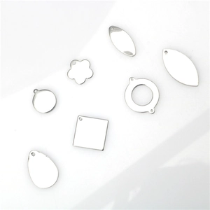 Polished stainless steel geometric charms including leaf and water drop shapes for DIY jewelry
