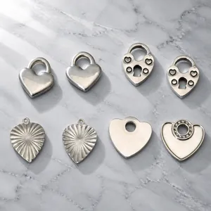 Polished stainless steel heart lock pendants in four diverse styles for DIY jewelry making