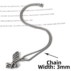 Detail of vintage angel wing pendant with 3mm wide box chain in stainless steel