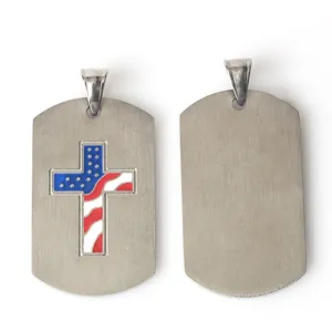 Detail of stainless steel cross pendant with American flag pattern and brushed metal finish