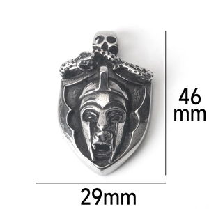 Detail of Spartan helmet pendant with skull and snake motifs in vintage stainless steel