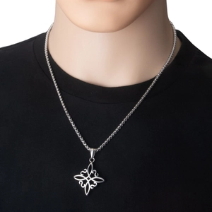 Macro view of vintage silver Celtic knot pendant on bead chain for men and women