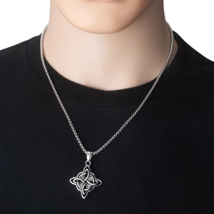 Detail of silver Celtic witch's knot pendant on box chain worn by male model in black shirt