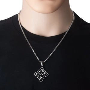 Silver Celtic knot pendant necklace shown on black t-shirt with Venetian chain detail