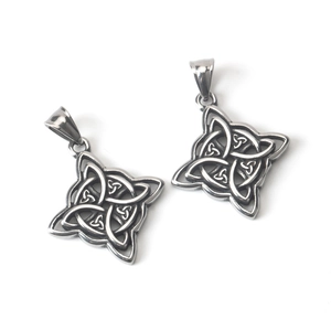 Vintage stainless steel Celtic knot pendants with black oxidized finish on white background