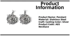 Macro detail of silver stainless steel pendant with intricate dragon relief pattern